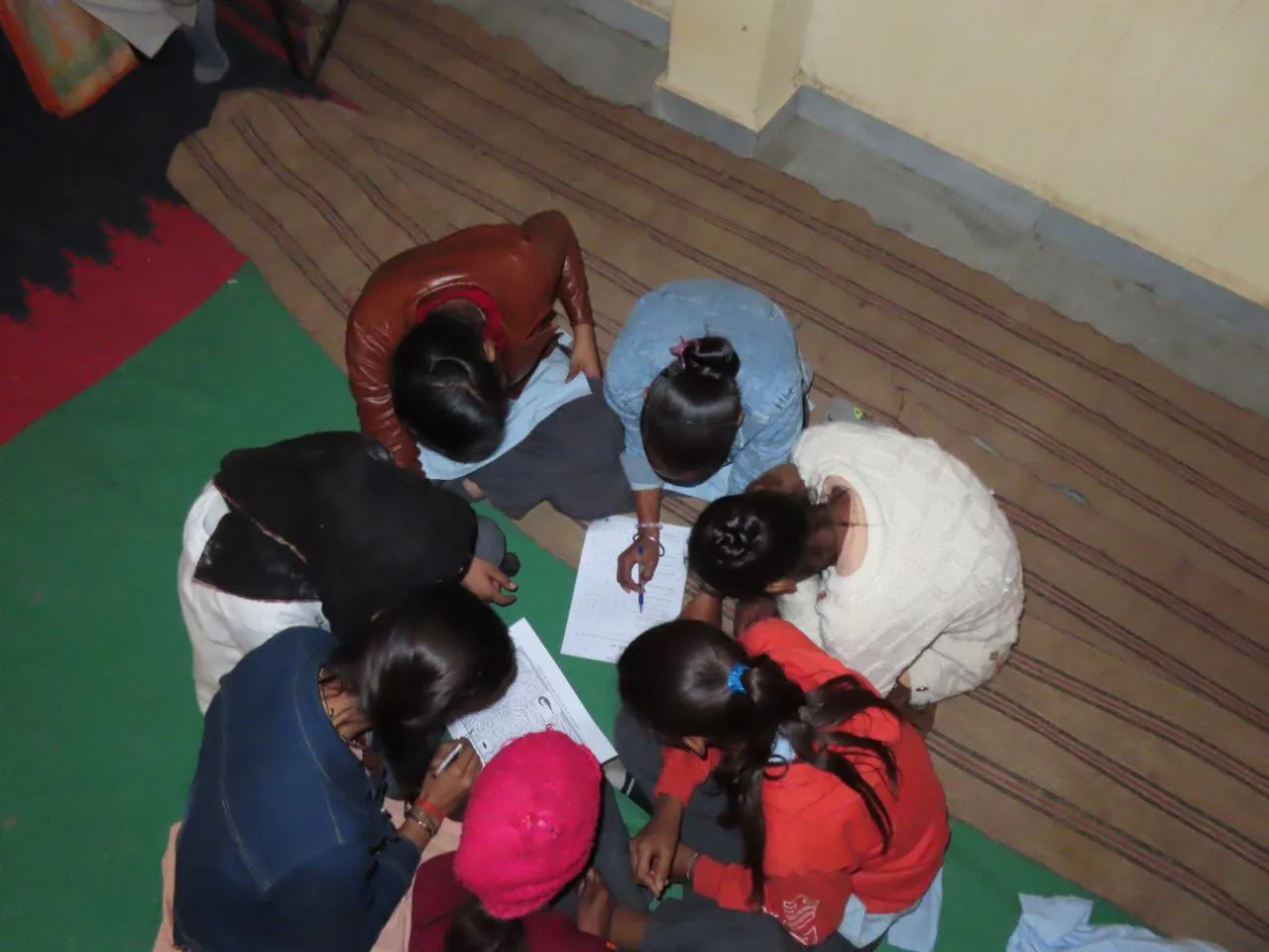 Students working together on an activity sheet